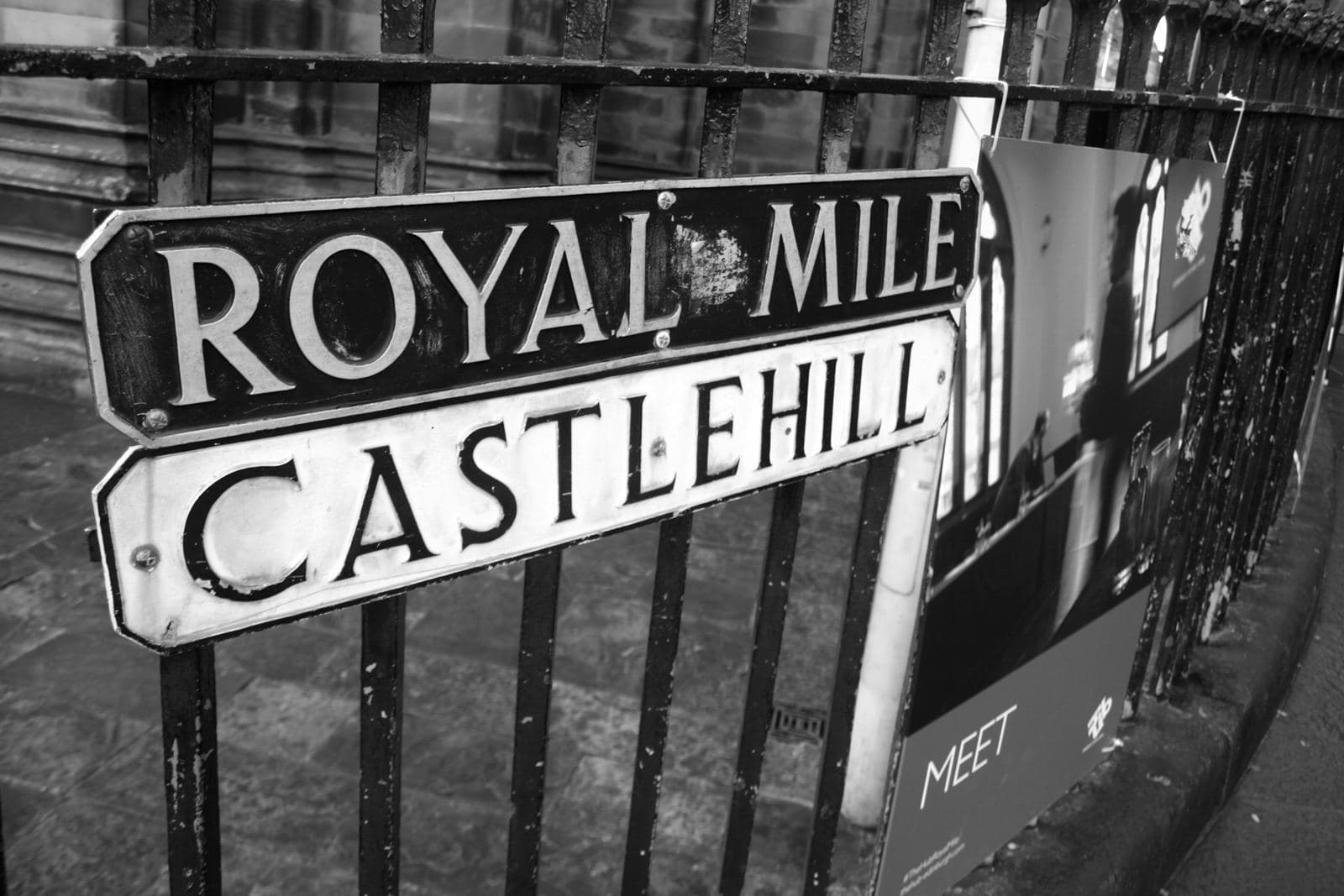 Royal Mile signage in Edinburgh's Old Town, the heart of the Edinburgh Festival Fringe. Photo by Jennifer Bonauer on Unsplash.